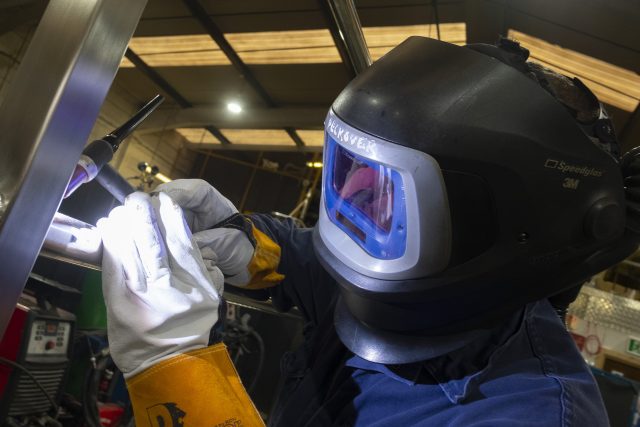 A welder working on a job at Tadweld.